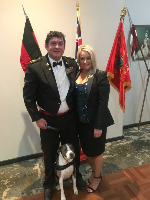 Lachy and Megan Armfield with Lachy's assistance dog Blu Jane at an army function in Merimbula on September 14, 2019. Picture supplied. 