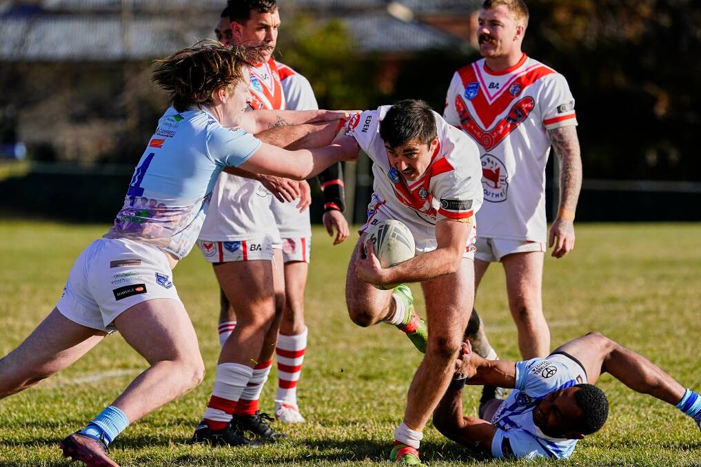 Eden Tigers - Rhyse Grewar in mid tackle during the Eden vs Bombala Rugby League game at Bombala on July 8, 2023. Picture taken by Razorback Photography