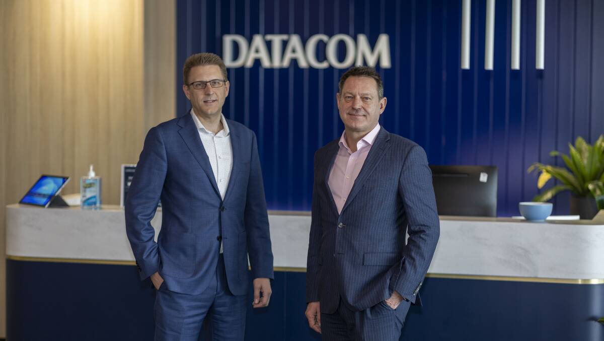 Mark Hile and Mike Fuller of tech company Datacom in the firm's new Canberra offices. Picture by Gary Ramage