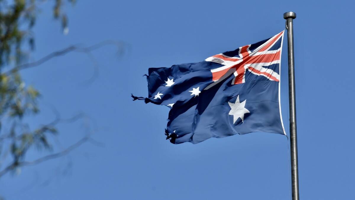 The torn Australian flag. Picture by Elesa Kurtz