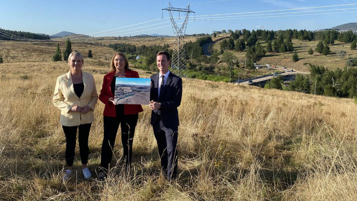 Infrastructure Minister Catherine King, centre, with Labor MLA Marisa Paterson, left, and ACT Transport Minister Chris Steel with Coppins Crossing in the background. Picture by Jasper Lindell