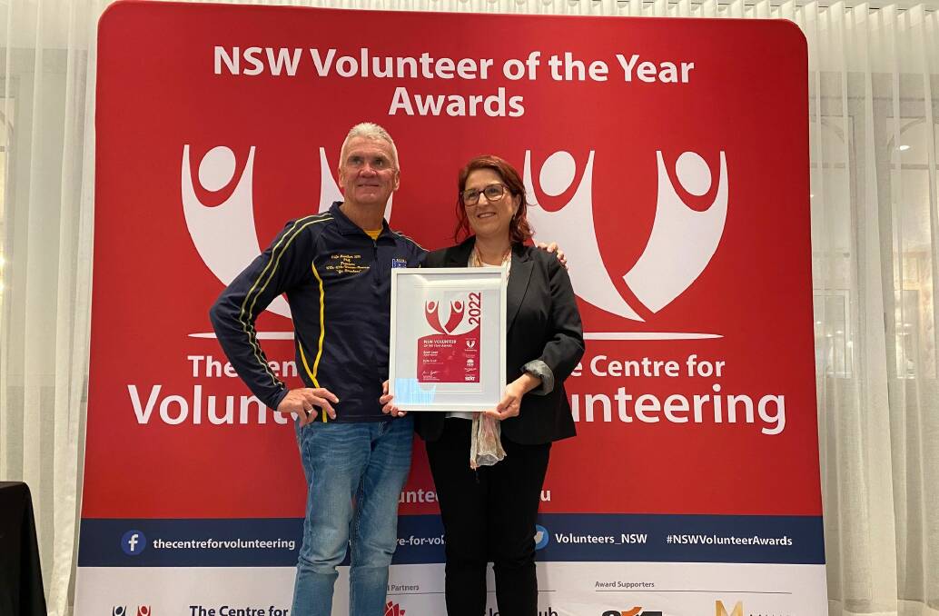 Kylie Scott (right) who has been volunteering for Bermagui Breakers AFL club since 2014 was named 2022 NSW adult volunteer of the year in the South Coast region Photo supplied