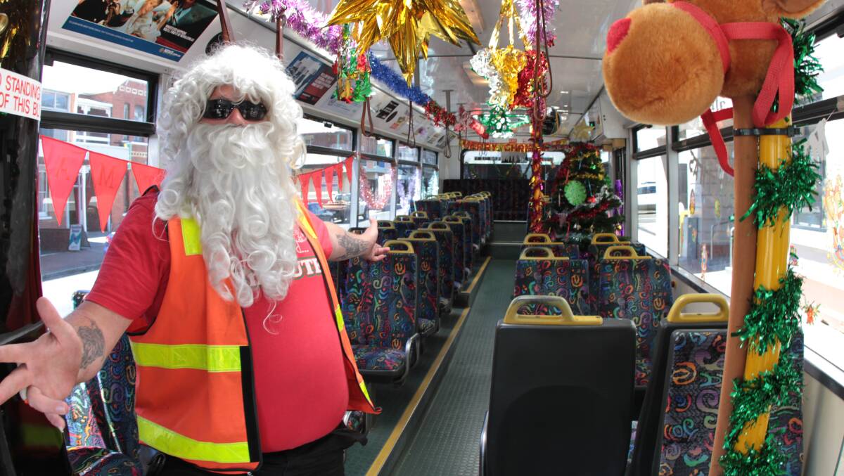 Bus drivers dressed as Santa deserve a four-day working week as much as anyone else. Will the government pay for it? Picture by Grant Wells
