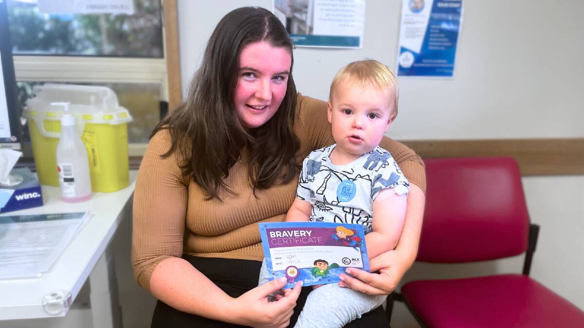 Alice Watt with baby Logan, who got his free flu vaccine on Thursday. Picture by Lanie Tindale