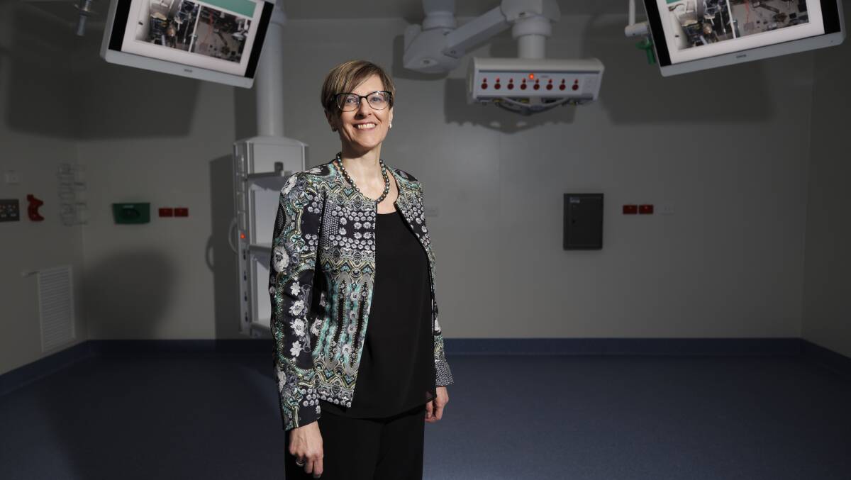 North Canberra Hospital general manager Dr Elaine Pretorius in a revamped operating theatre, following a fire in December 2022. Picture by Keegan Carroll