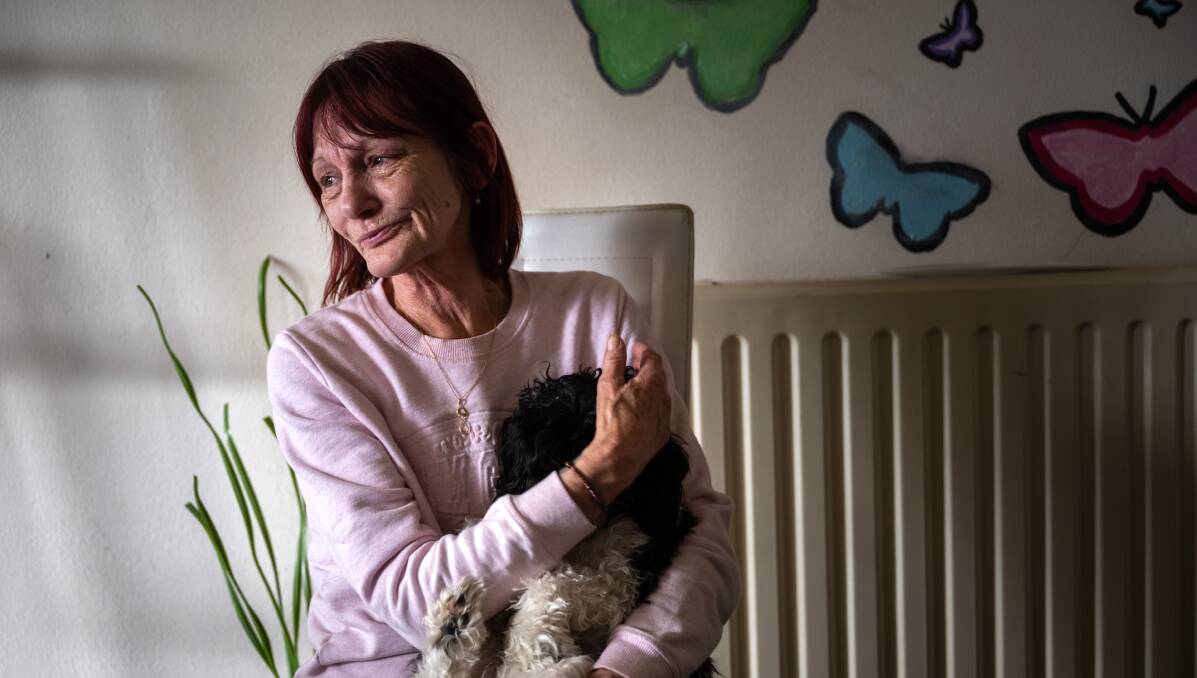Salvation Army housing tenant, Lee Stuart with her dog Daisy, becomes emotional talking about her time in the Narrabundah complex. Picture by Elesa Kurtz