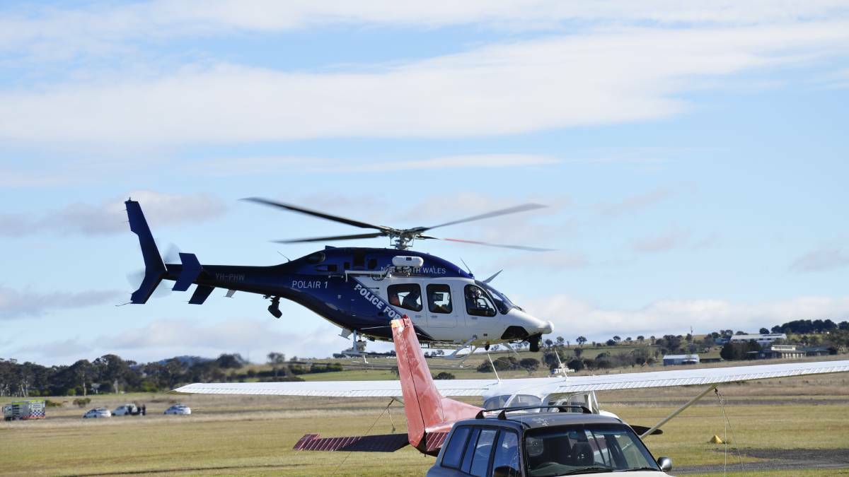 A Polair helicopter took off from Goulburn Airport on Sunday afternoon. Picture: Louise Thrower.

