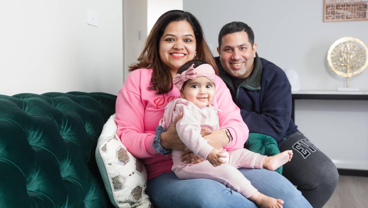 Asif and Benazir Badsha Zaidi with their eight-month-old daughter Alayna at home in Taylor. Picture by Sitthixay Ditthavong