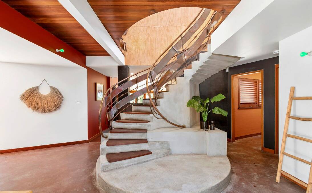 The home features a statement, spiral staircase. Picture supplied