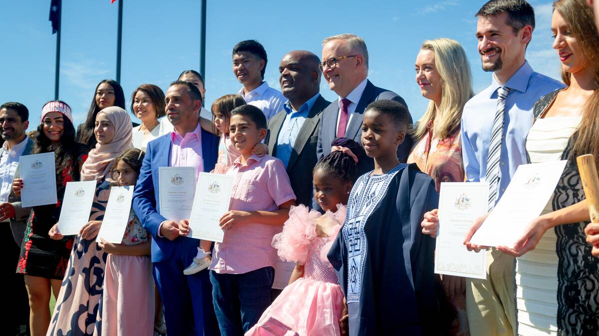Prime Minister Anthony Albanese with new citizens at the 2023 Australia Day citizenship ceremony in Canberra. Picture by Elesa Kurtz