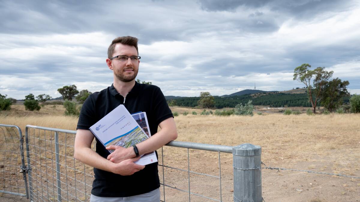 Molonglo Valley Community Forum convener Ryan Hemsley stands in front of the future commercial centre. Picture by Elesa Kurtz