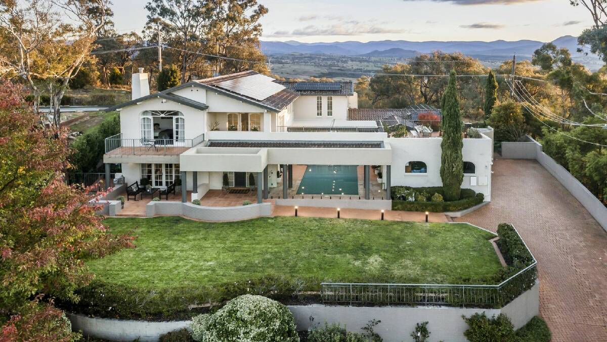 A five-bedroom house in Hawker broke the suburb record when it sold at auction. Picture supplied