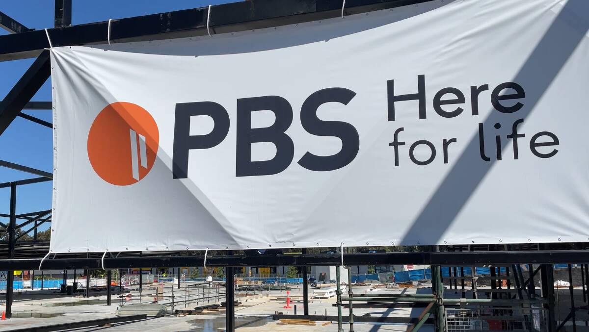 PBS Building construction company signage pictured at the Belconnen Markets building site in March 2023. Picture by Brittney Levinson