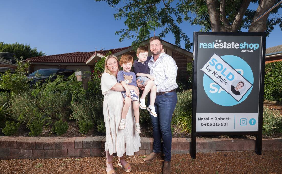Danielle and Matthew Hooper, with their sons Alfie and Henry, outside their Dunlop home. Picture by Sitthixay Ditthavong