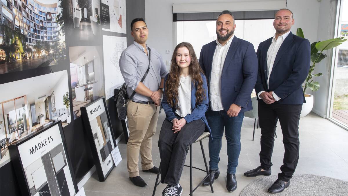 EV On co-founder Aliqua James, front, with Custom Apartments directors Shane Anderson, Peter Micalos and Mena Ibrahim at the sales office for Belconnen residential development The Markets. Picture by Keegan Carroll
