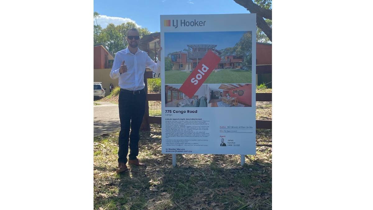 LJ Hooker Moruya agent James Hamilton pictured outside Flea's home following the auction. Picture supplied