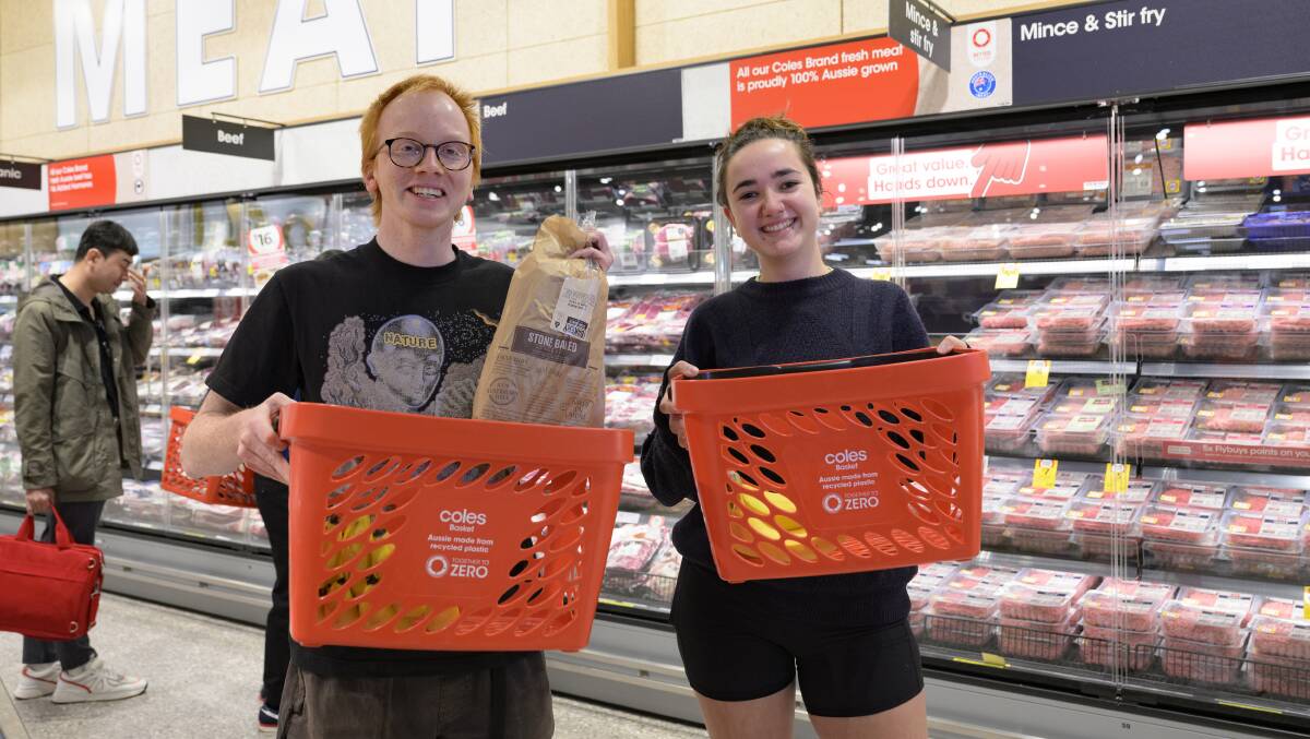 Local residents Hugo Hyde and Emmanuella Herrman were among the first shoppers at the new Dickson Coles. Picture by Keegan Carroll