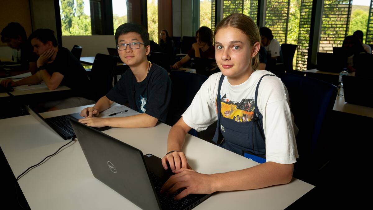 Year 12 students Chris Yoo and Lily Watt take part in a cyber security workshop with ASD at the ANU, Co-Lab. Picture by Elesa Kurtz