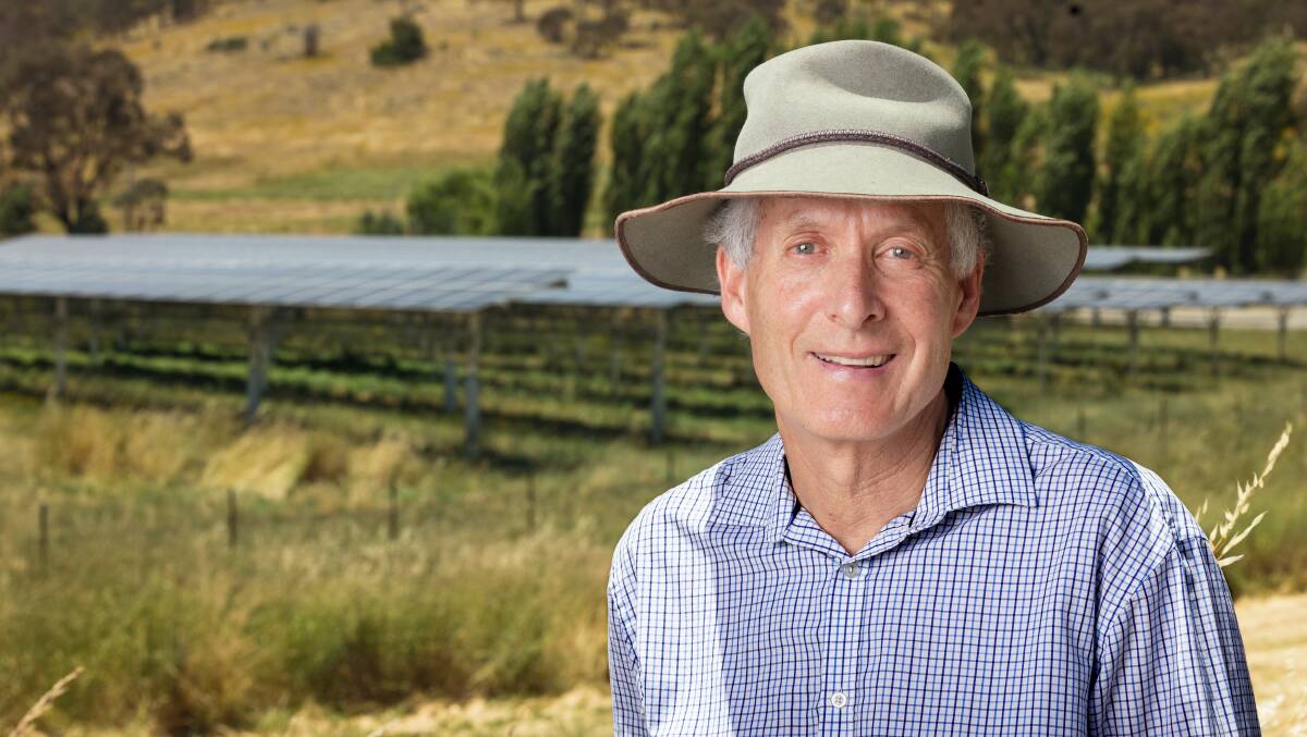 Professor Andrew Blakers in front of solar panels. Picture by Sitthixay Ditthavong