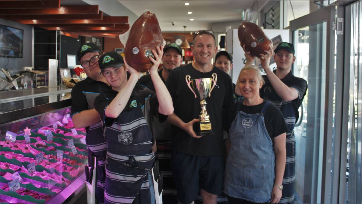 The Bayside Meats & Deli team with their award winning hams. Picture by James Tugwell.