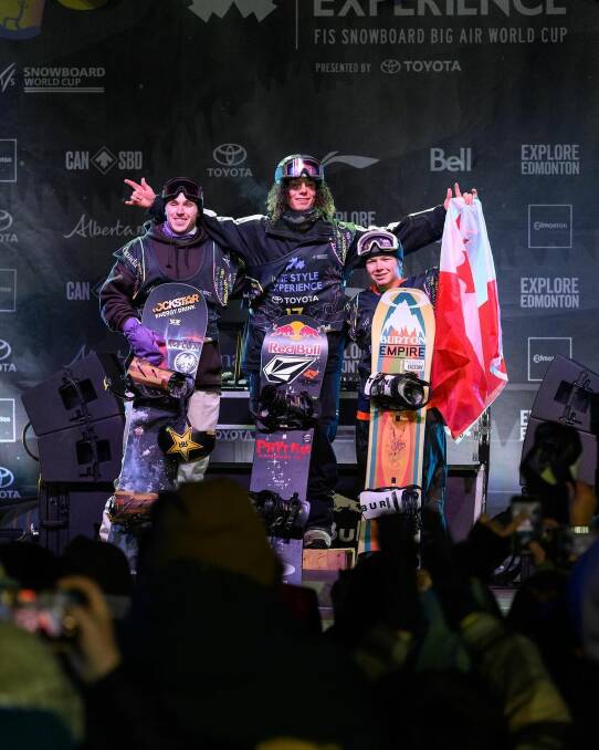Dalmeny's Valentino Guseli on top of the podium at FIS Edmonton Style Experience Big Air competition in Canada. Picture by Daniel Stewart.
