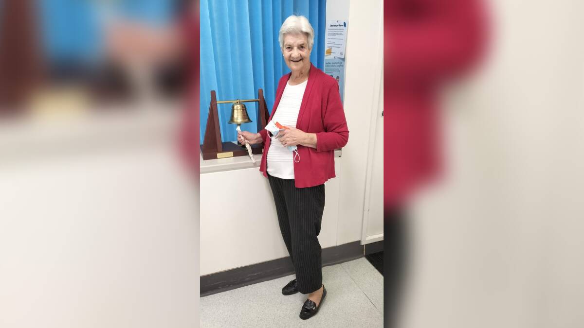 Daphne Sweeney ringing the bell at the end of her radiation therapy in Canberra. Picture supplied.