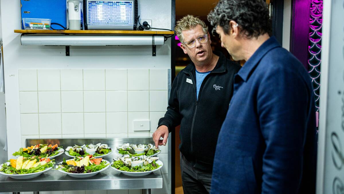 Celebrity chef Colin Fassnidge (right) and Ccooks at Corrigans owner Andrew Johns (left) in the kitchen during the filming of Kitchen Nightmares. Picture supplied.