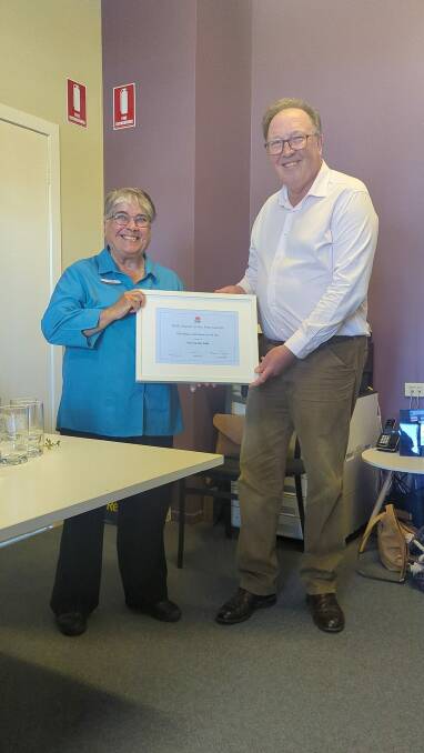 Trish Ellis OAM and Dr Michael Holland at the presentation of the award. Picture supplied.