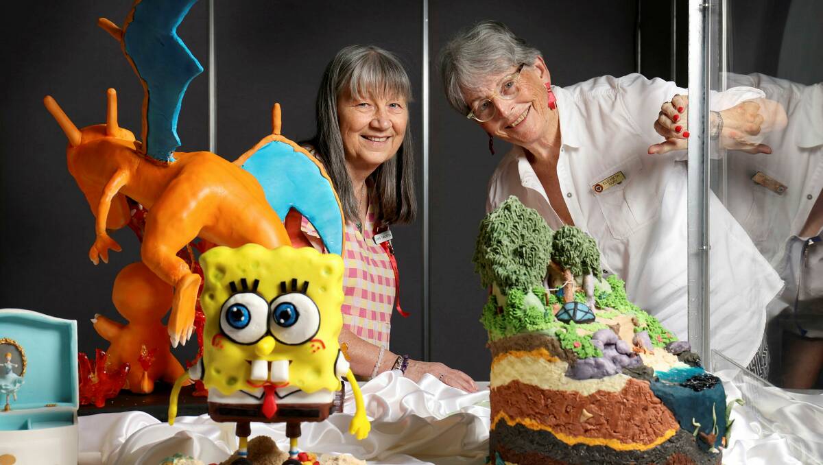 Steward Chris Tarlington, left, and Cake decorating judge Elizabeth Ivory at the Royal Canberra Show held at EPIC. Picture by James Croucher