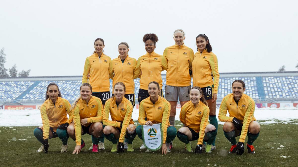 The Young Matildas in Tashkent with snow on the pitch before kick-off. Picture Football Australia