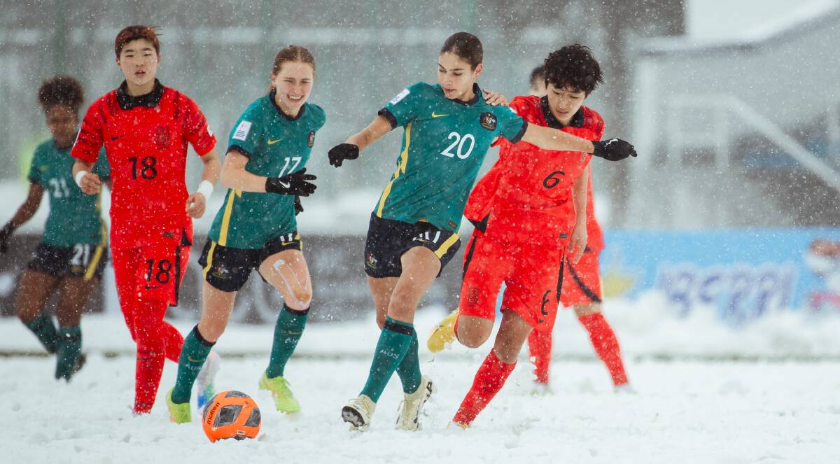 The Young Matildas struggled through thick snow. Picture Football Australia