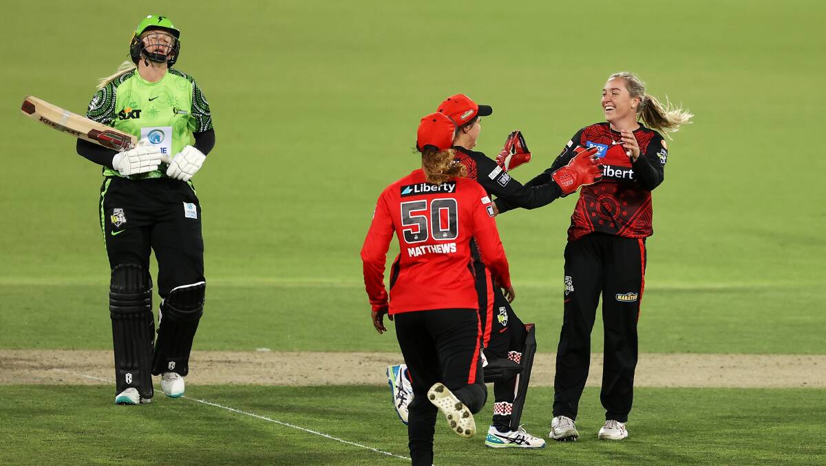 Renegades bowler Georgia Prestwidge celebrates taking the wicket of Sammy-Jo Johnson of the Thunder. Picture Getty Images