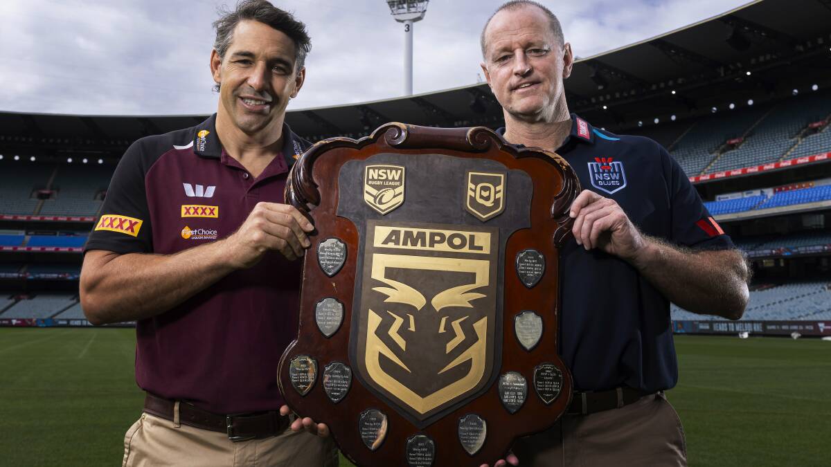 Billy Slater and Michael Maguire with the Origin shield. Picture Getty Images