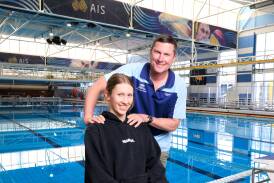 Teenage swimmer Ava Rollason and her dad and coach Shannon Rollason. Picture by Sitthixay Ditthavong