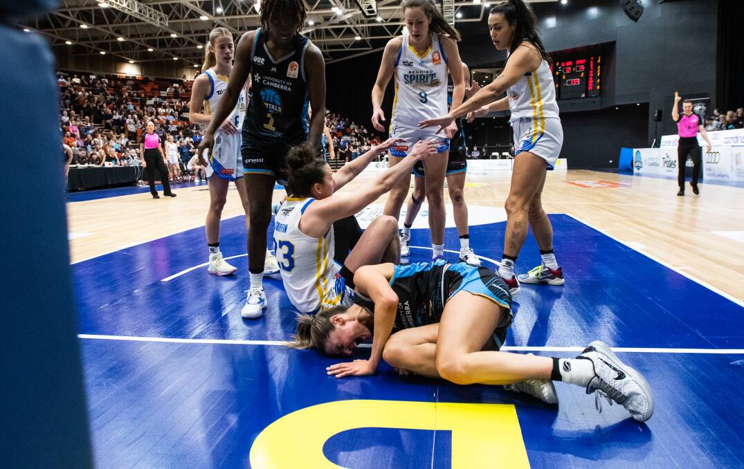 Gemma Potter was in agony on the court at the National Convention Centre. Picture by Elesa Kurtz