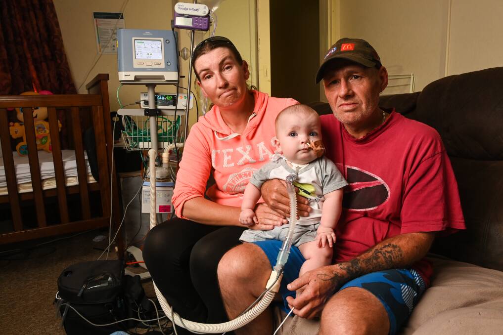 North Albury residents Melissa Campbell and Stephen Elkin say their one-year-old son James needs electricity 24 hours a day to power his ventilator but are struggling to find a new rental home anywhere. Picture by Mark Jesser