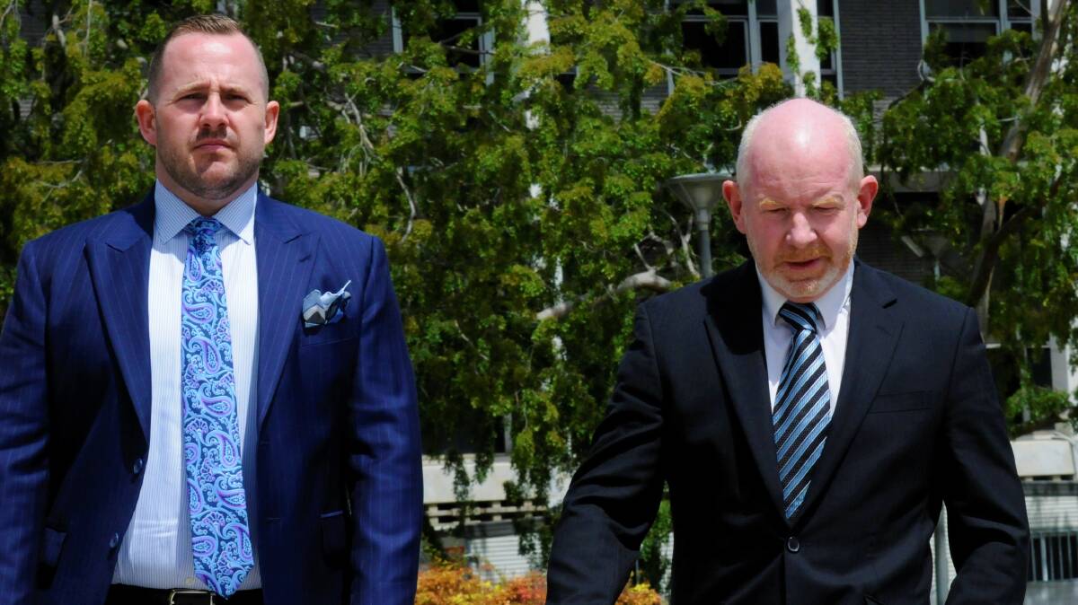 Stephen Mitchell, right, outside court on a previous occasion with defence lawyer Peter Woodhouse. Picture by Blake Foden