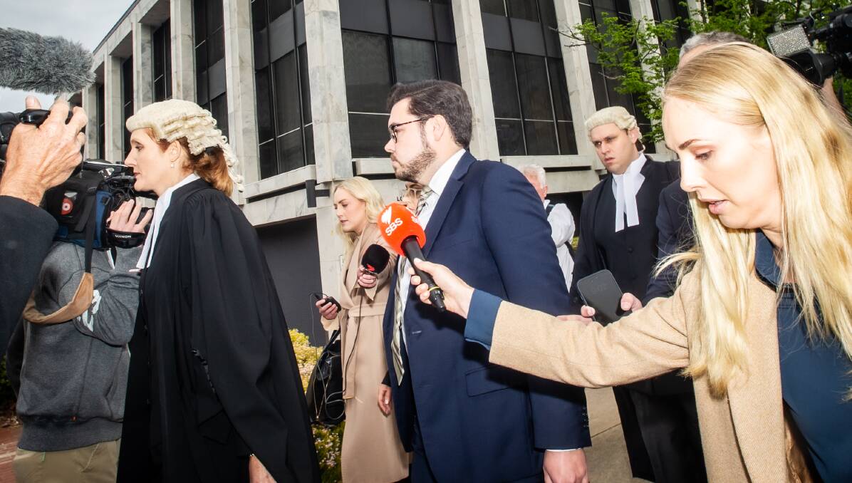 Chief Justice Lucy McCallum presided on the criminal trial of Bruce Lehrmann, pictured being swarmed by media outside court. Picture by Karleen Minney