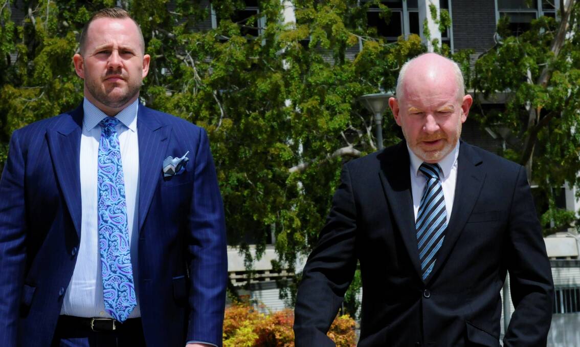 Stephen Mitchell, right, arrives at court with solicitor Peter Woodhouse. Picture by Blake Foden