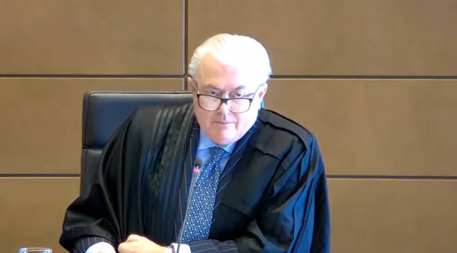 Justice Michael Lee delivering the defamation judgment last month. Picture screenshot