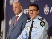 Australian Federal Police Commissioner Reece Kershaw, right, and ASIO director-general Mike Burgess say Australia's interests don't appear to have been compromised. Picture by AFP