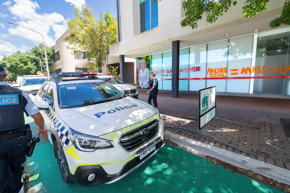 Police arrive to respond to Extinction Rebellion members occupying Senator Katy Gallagher's office in Woden on Thursday. Picture by Sitthixay Ditthavong