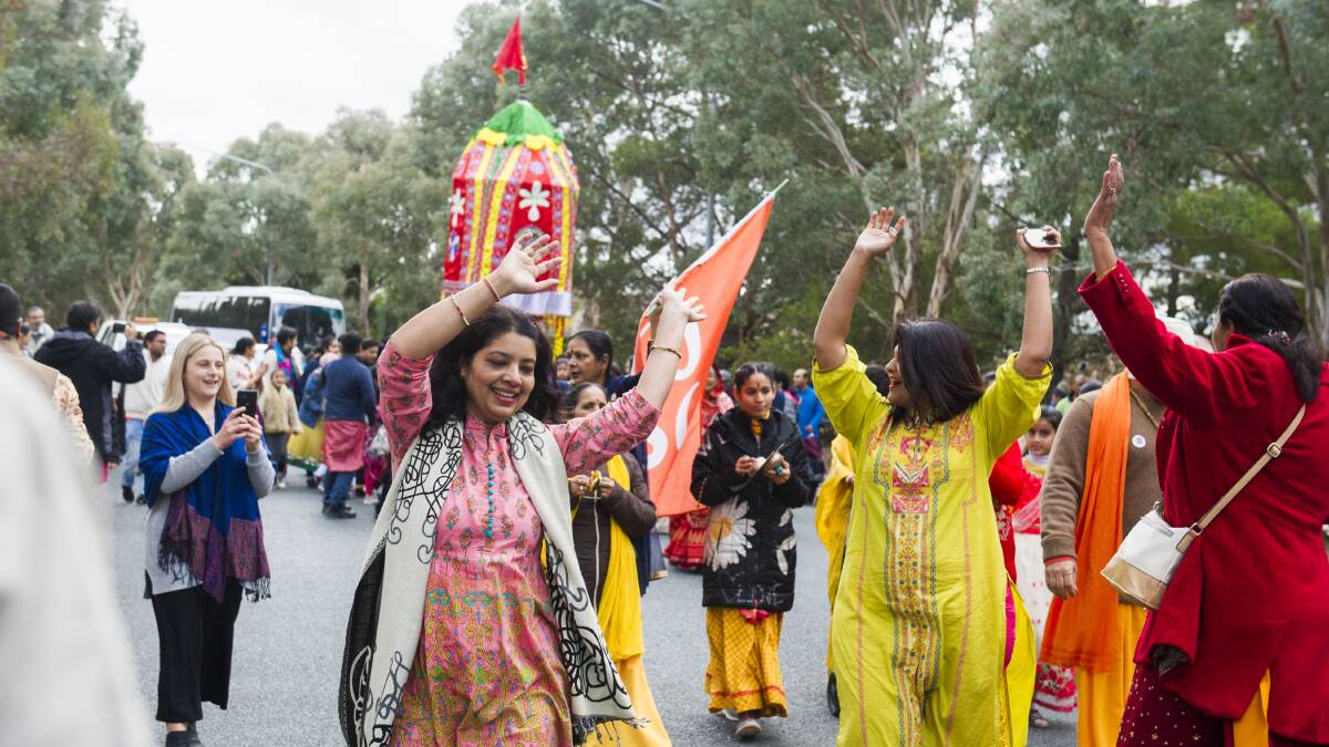 Devotees gathering and dancing in the Chariot Festival at the Florey Hindu Temple and Cultural Centre, in 2019. Picture by Dion Georgopoulos