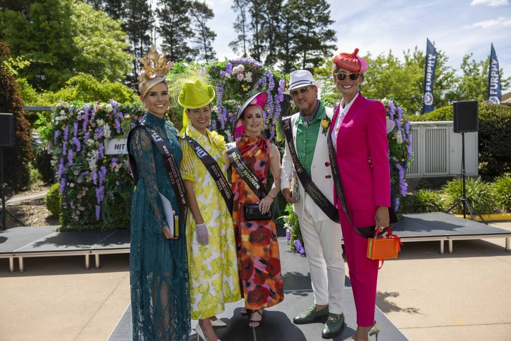 Fashions on the Field runner up - Sabrina Webb and winner Viviana Croker with Millinery winner Zara Castellaz-Faico with Best suited winner Craig Smythe and runner up Brooke Strahan. Picture by Gary Ramage