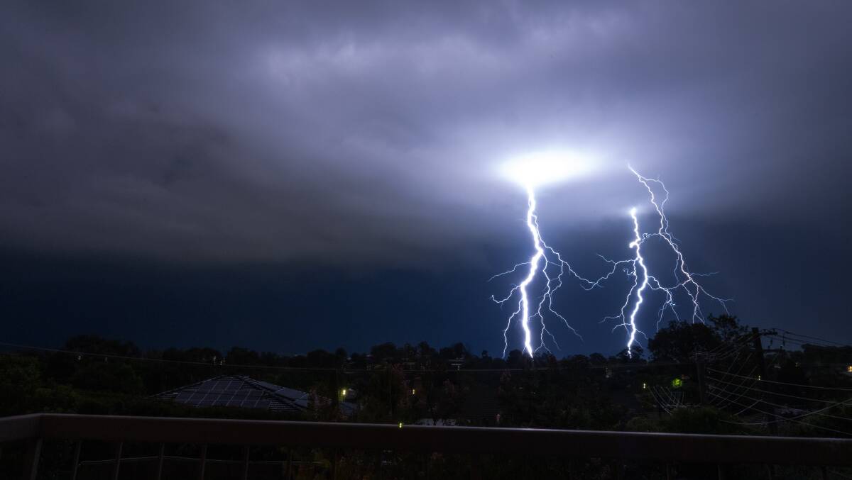 Lightning in Tuggeranong during a thunderstorm on January 2. Picture by Elesa Kurtz