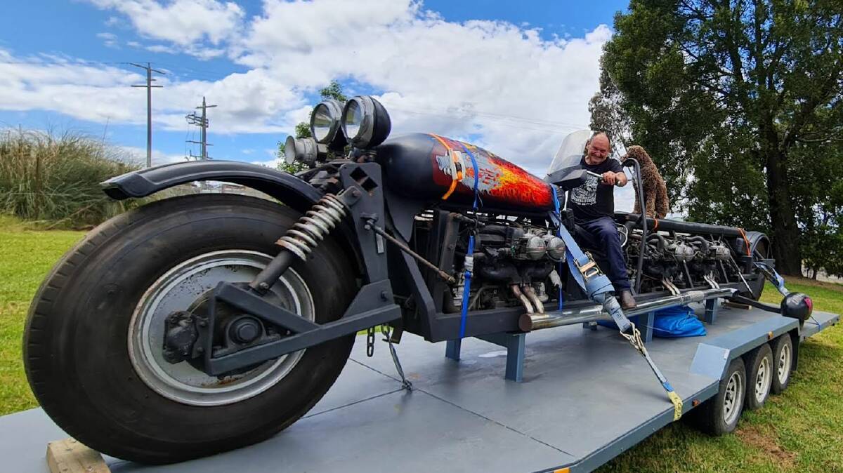 Mark Ward from the Amazing Mill Markets in Daylesford is the new owner of this 36-cylinder bike - which once held the record for the world's longest. Picture by Gabrielle Hodson.