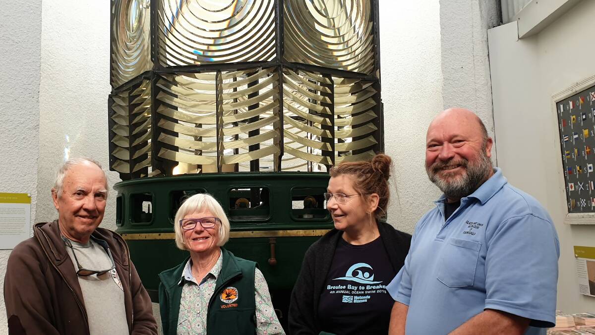 Former National Parks and Wildlife Service employee Paul Bourke (left) shared some of his stories from working on Montague with volunteer tour guides Annabelle Cassells, Kotti Sallai and Rob Patzke at Narooma Historical Society's talks at the weekend. Photo: supplied