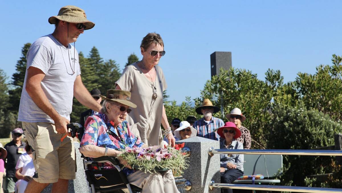 June Carnegie laying a wreath at Bermagui's Anzac Day service. Mrs Carnegie is 99 and served in the Australian Women's Army Service at the age of 18 in 1942. Picture supplied.