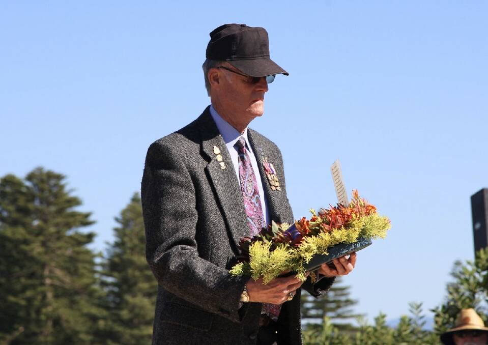 Laying one of around 18 wreaths at Bermagui on Anzac Day was Vietnam War veteran Mike Robert, who served in America's 101st Airborne Division. Mr Robert is a member of Bermagui RSL and lives in Australia. Picture supplied.