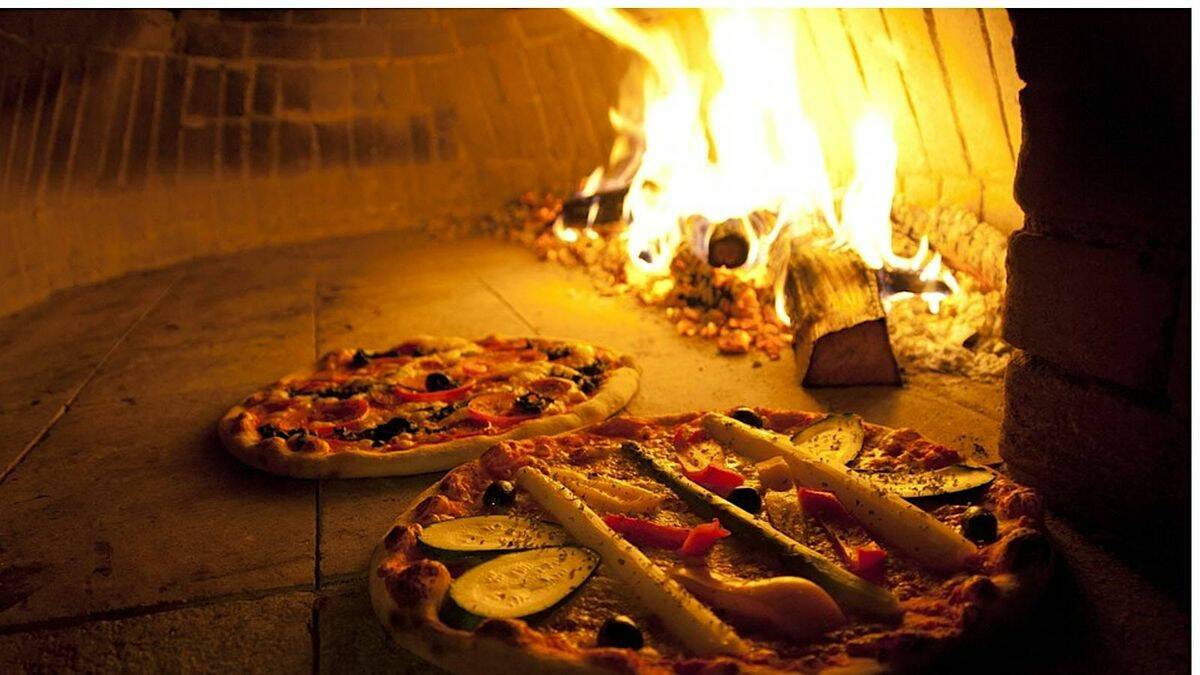 Enjoy wood-fired pizza as part of the 'Lighting Wood Oven' community afternoon. Picture supplied. 